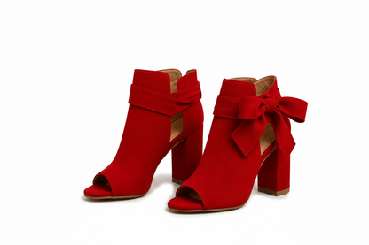 Botines de tacón con moño decorativo